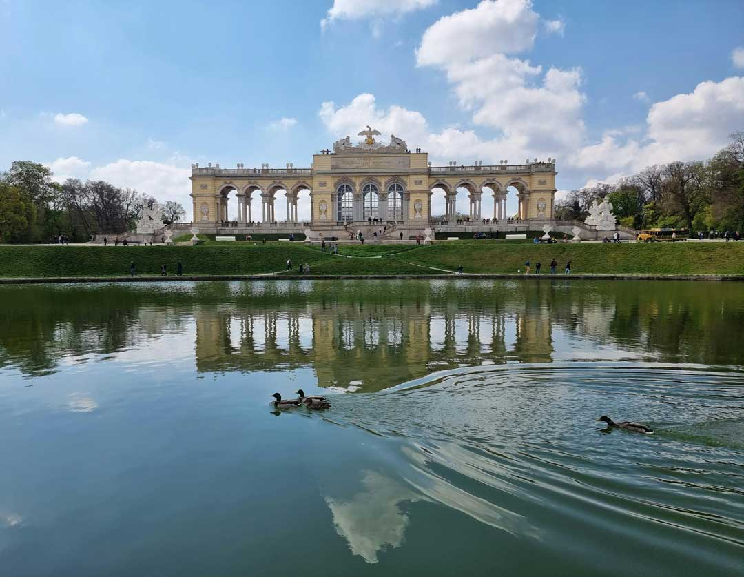 Gloriette; tourist hotspot in Vienna; a lake in front and beautiful blue sky in the back