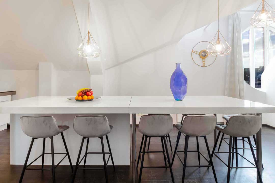 Elegant bar stools and vases in serviced apartment in Vienna