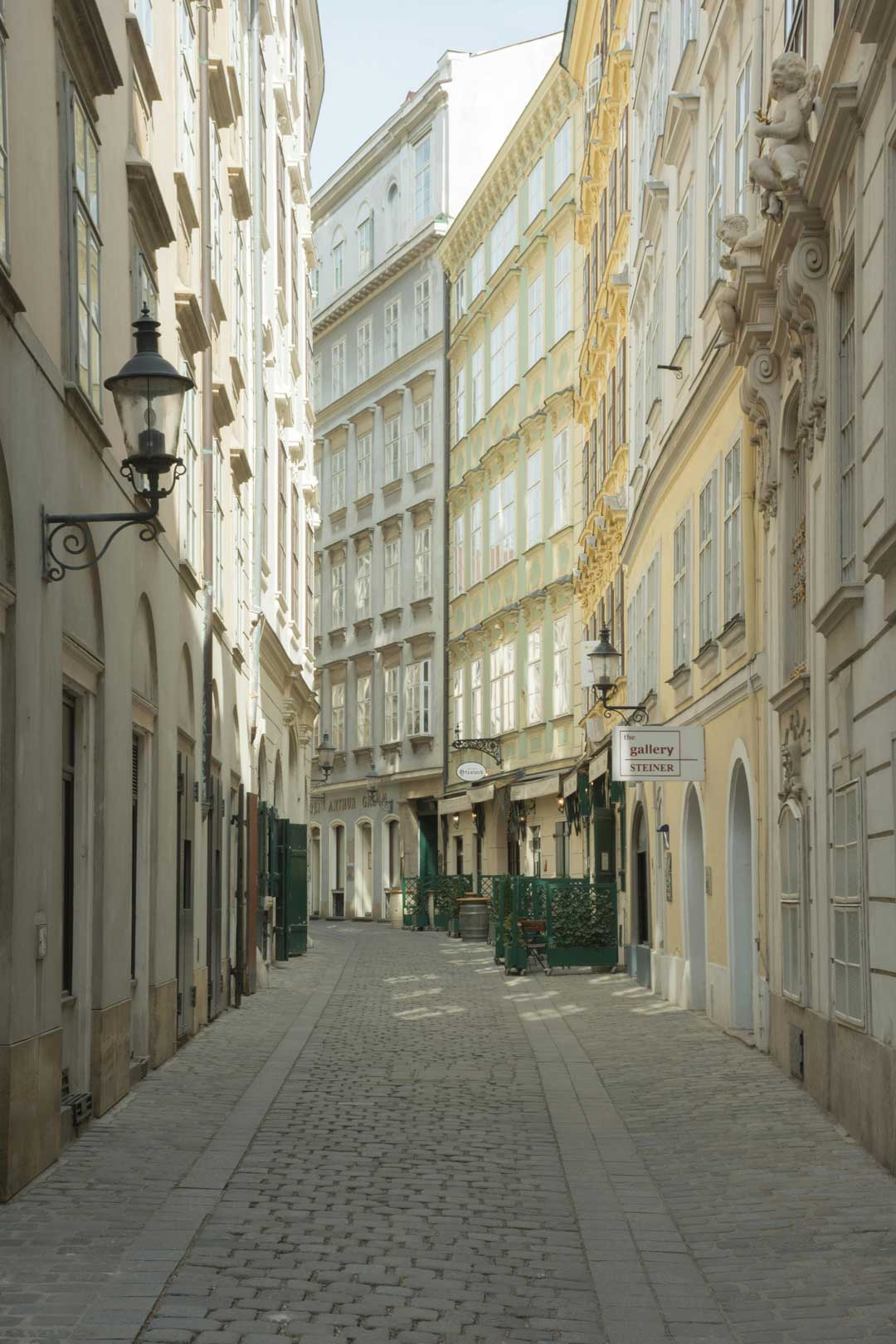 Small sunny street with a historic and charming character in the 8th district in Vienna