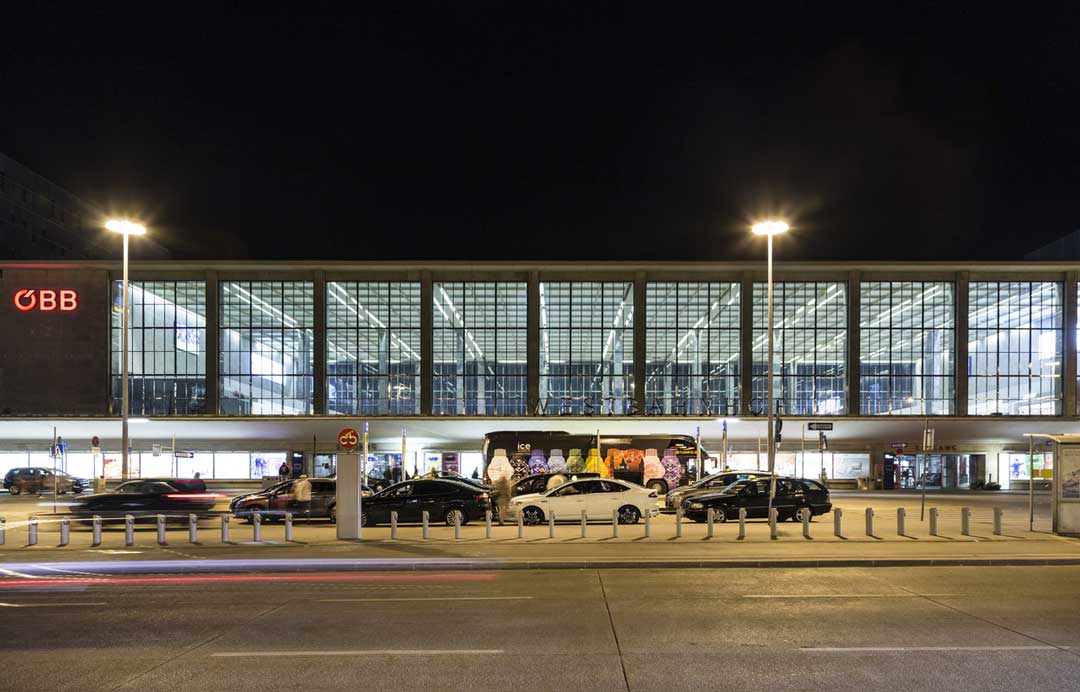 Facade of Westbahnhof in Vienna by night. Trains from the Austrian Federal Railway company or OBB, stop at the Wien Westbahnhof railway station in Vienna.